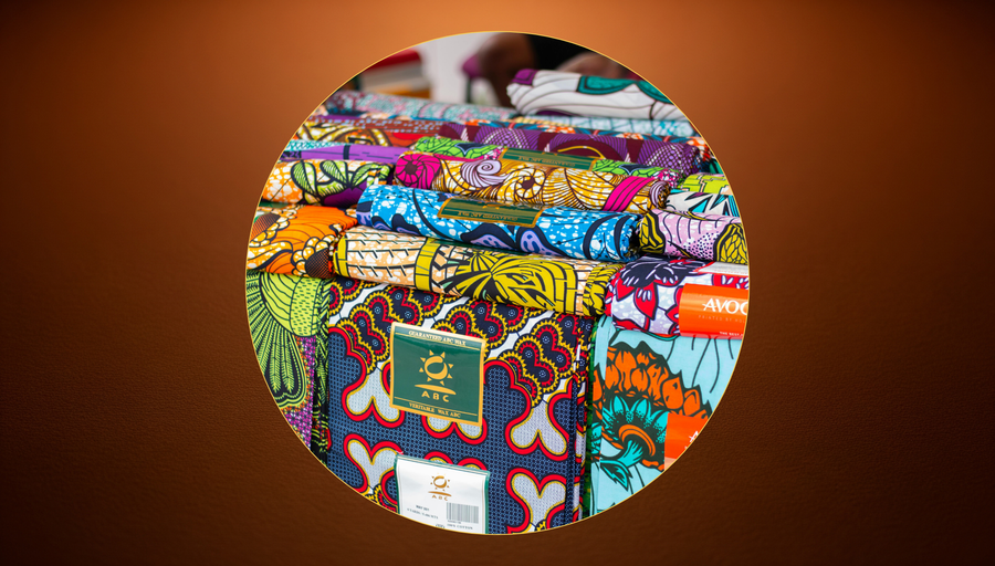 Close-up of richly patterned African fabric featuring Adinkra motifs. African Prints and Patterns – Meaning, History & Symbolism