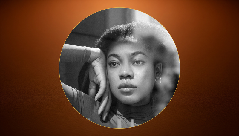 A face in repose, interior, not performing for the camera.