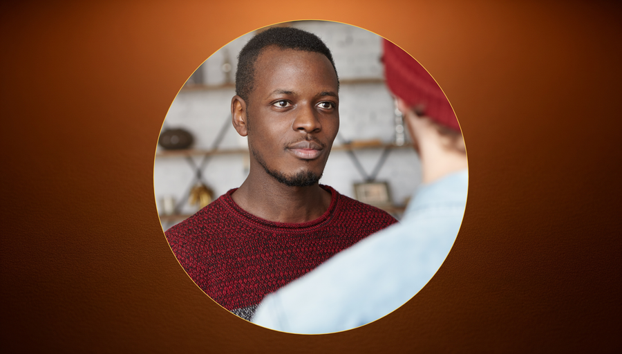 Two people in deep conversation — illustrating the Akan concept of Akoma, the Adinkra symbol of patience, tolerance, and the goodwill we extend before we respond